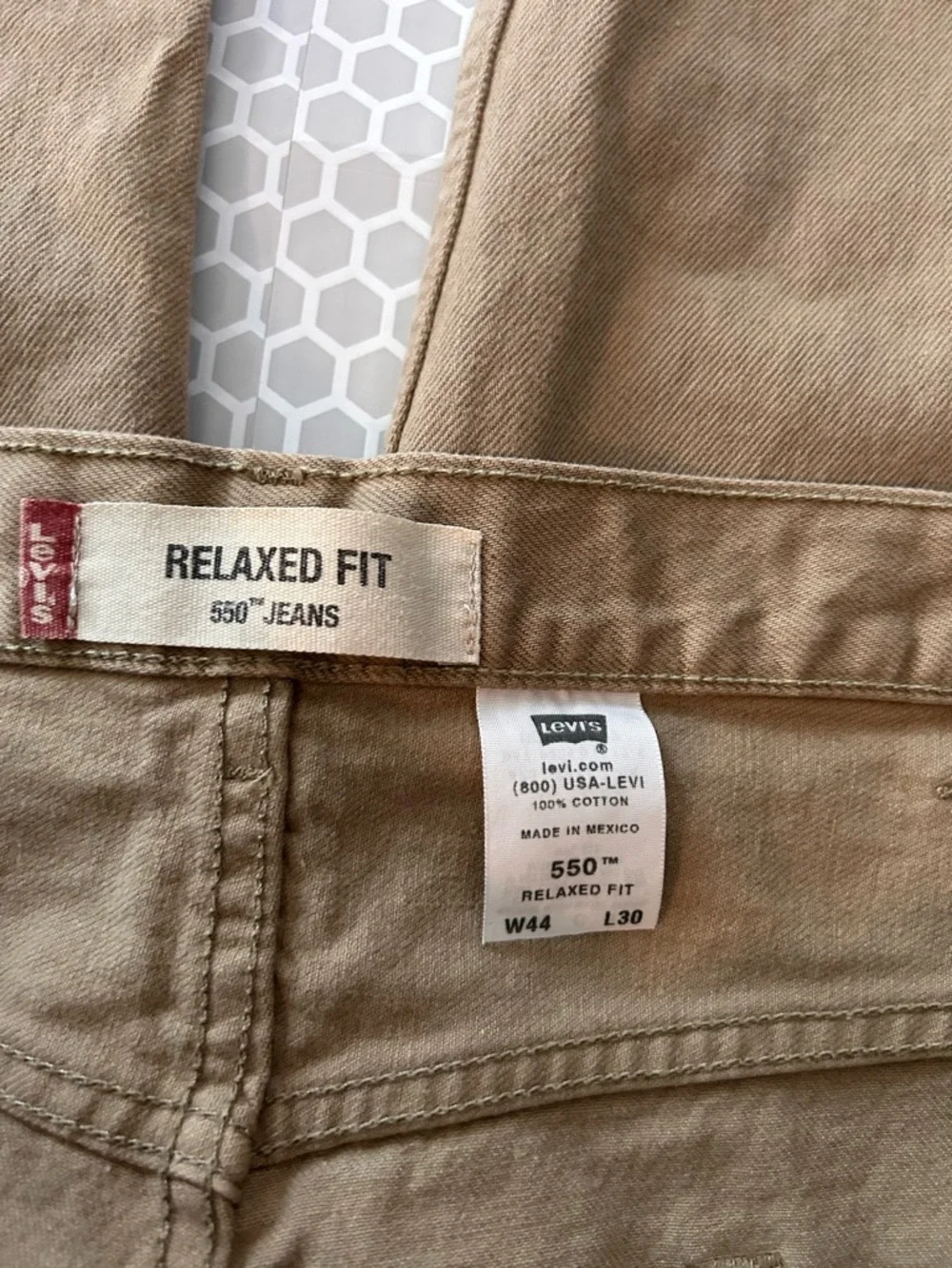 Levi's relaxed fit 550 jeans in khaki tan.  Size 44X30. Cotton